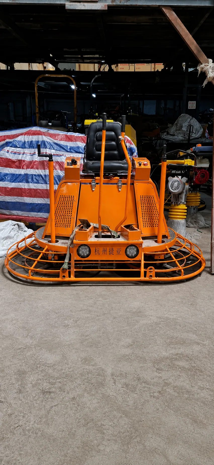 Ride-on power trowel, front view